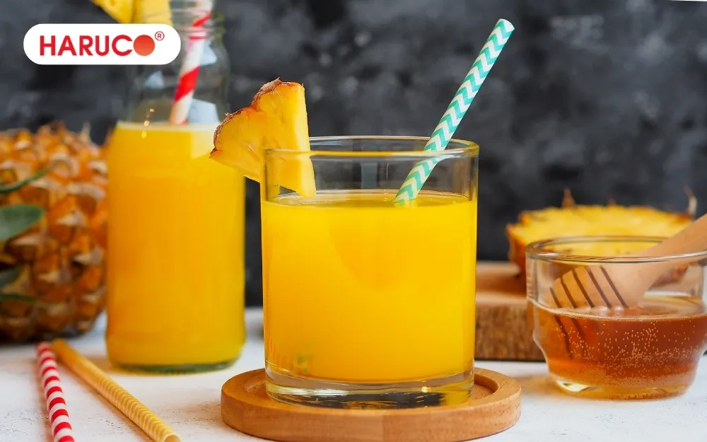 Uống nước dứa với mật ong hỗ trợ tiêu hóa, giảm đầy bụng